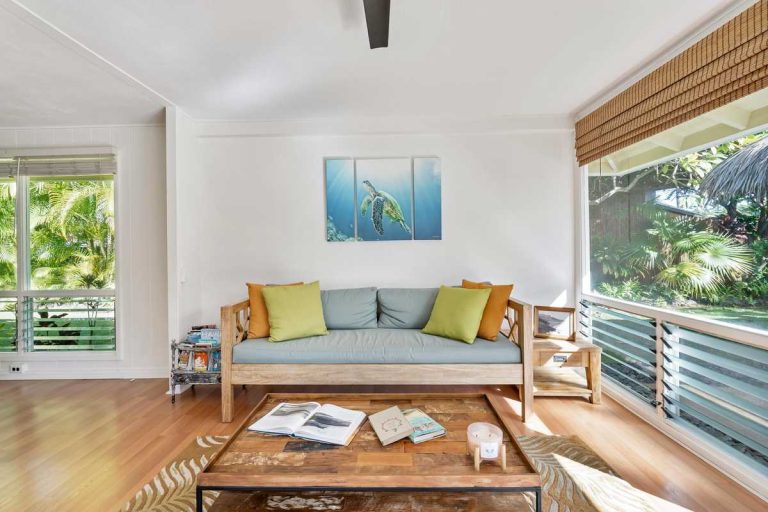 Bright and harmonious living room with natural lighting, illustrating modern Feng Shui design principles