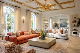 Elegant living room with bright natural light, balanced Feng Shui layout, and harmonious Qi energy flow