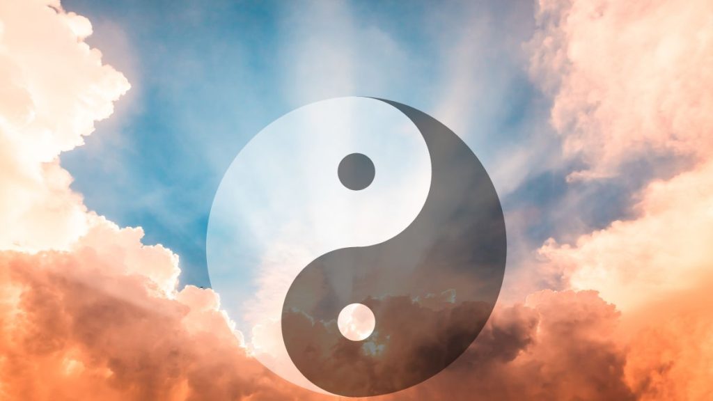 Yin-Yang symbol floating in serene sky representing the five sacred principles of ancient Chinese philosophy for modern life balance