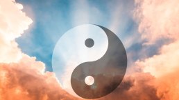 Yin-Yang symbol floating in serene sky representing the five sacred principles of ancient Chinese philosophy for modern life balance